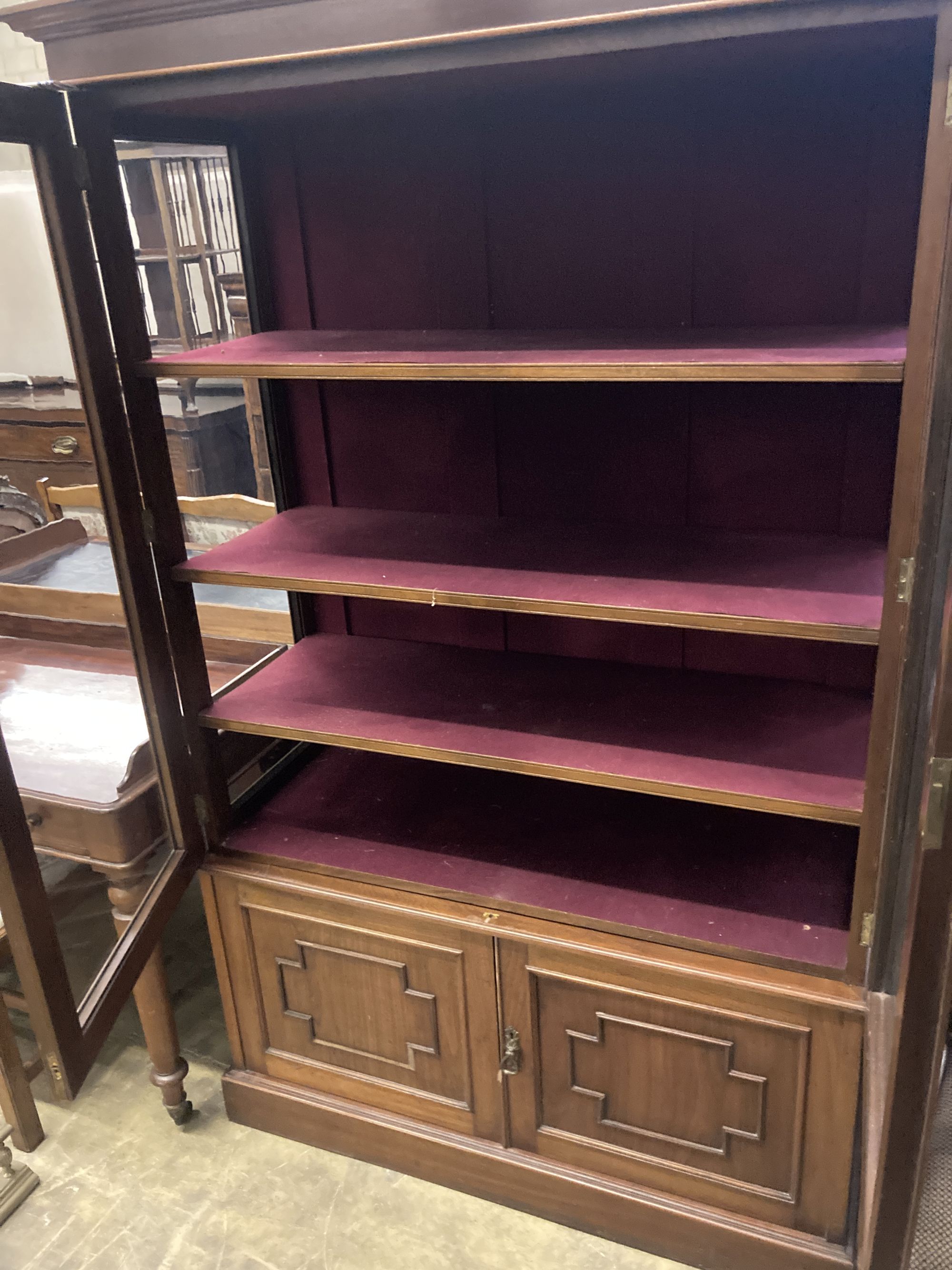 A Victorian mahogany glazed display cabinet, width 115cm, depth 46cm, height 182cm